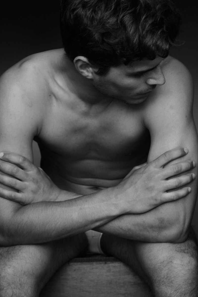 Venezuelan but raised in Valencia Spain captivated by lensman Miguel Zaragozá unveil exclusive imagery in black and white portrait for Fashionably Male.